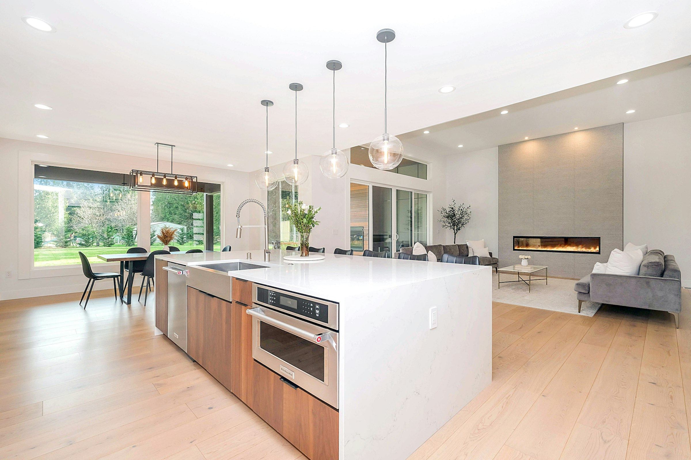 A bright, modern living room opening onto a patio